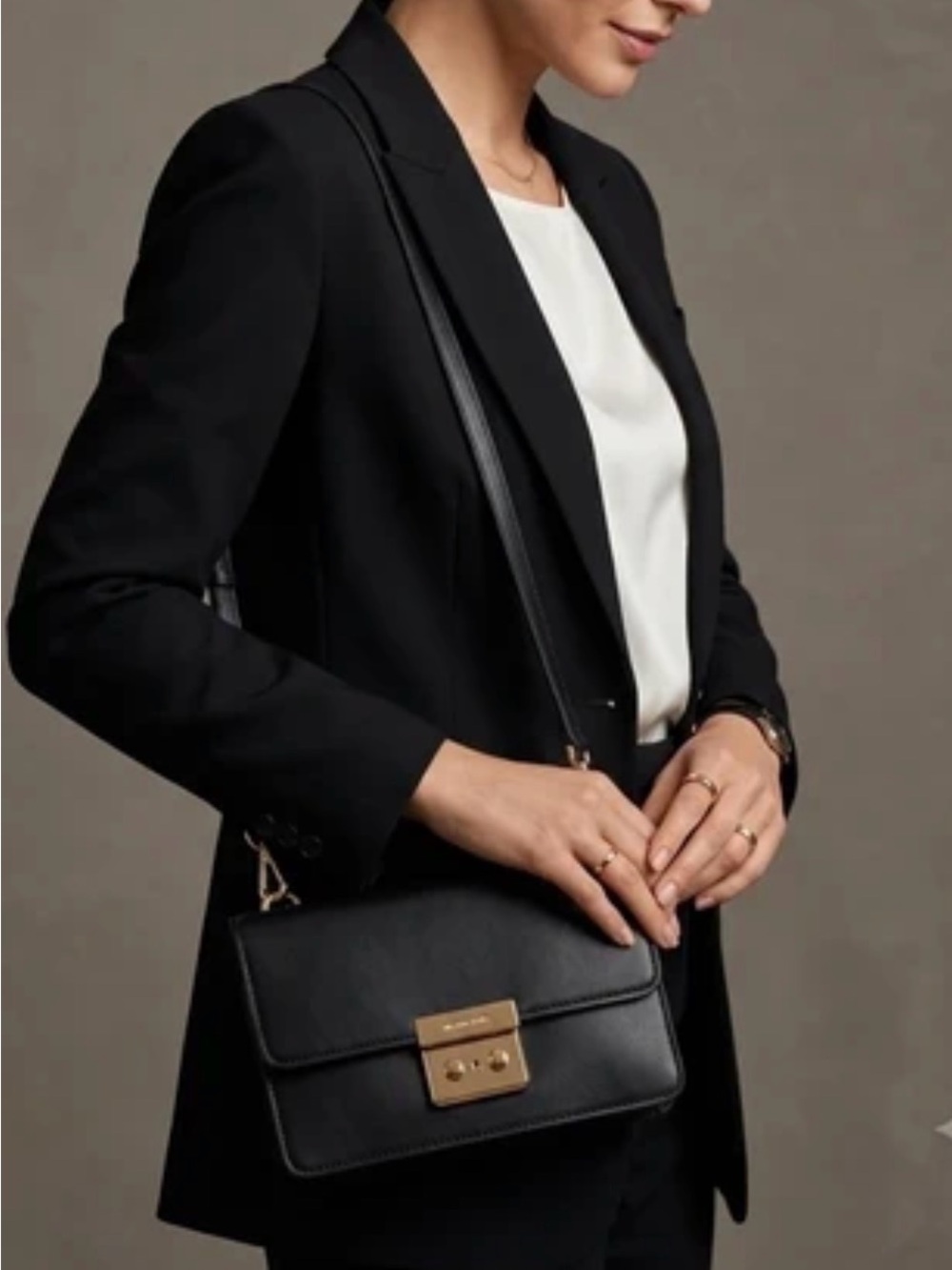 Classic Black Leather Crossbody Bag with Gold Hardware
